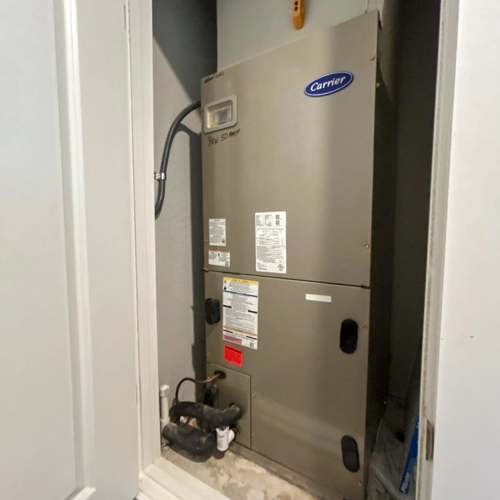Carrier air handler in a utility closet